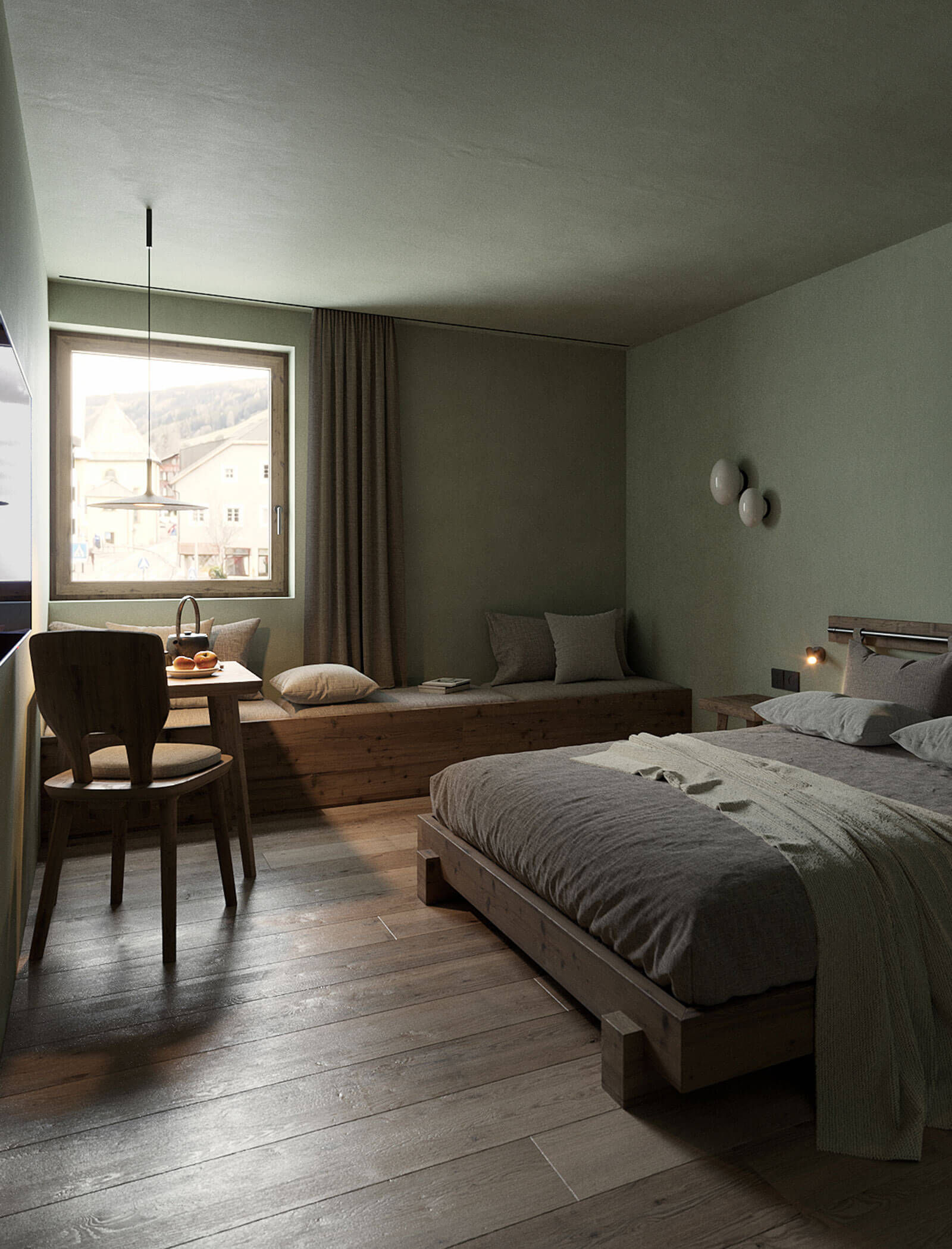 Minimalistisches Schlafzimmer mit Holzbett, Fensterbank, kleinem Tisch und Stuhl, sanfter Beleuchtung und gedämpften grünen Wänden. - Ansitz Toldt Dolomites Village