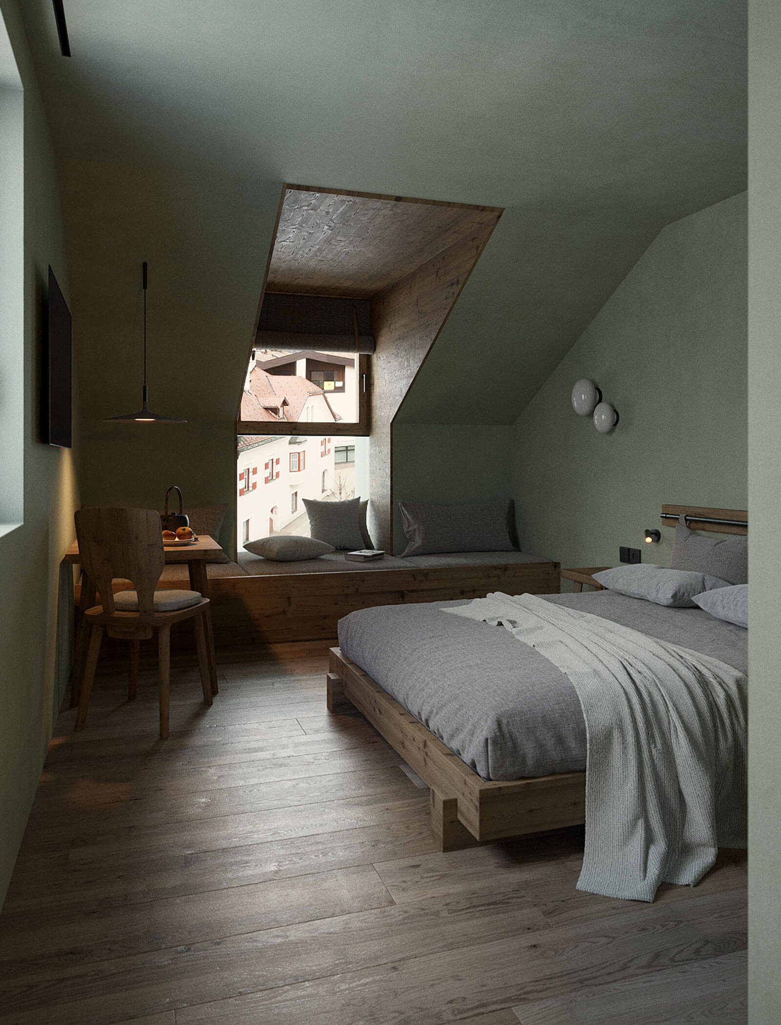 Modernes Schlafzimmer im Dachgeschoss mit Holzböden, grauer Bettwäsche, einem Fensterplatz und Blick auf die Dächer draußen. - Ansitz Toldt Dolomites Village